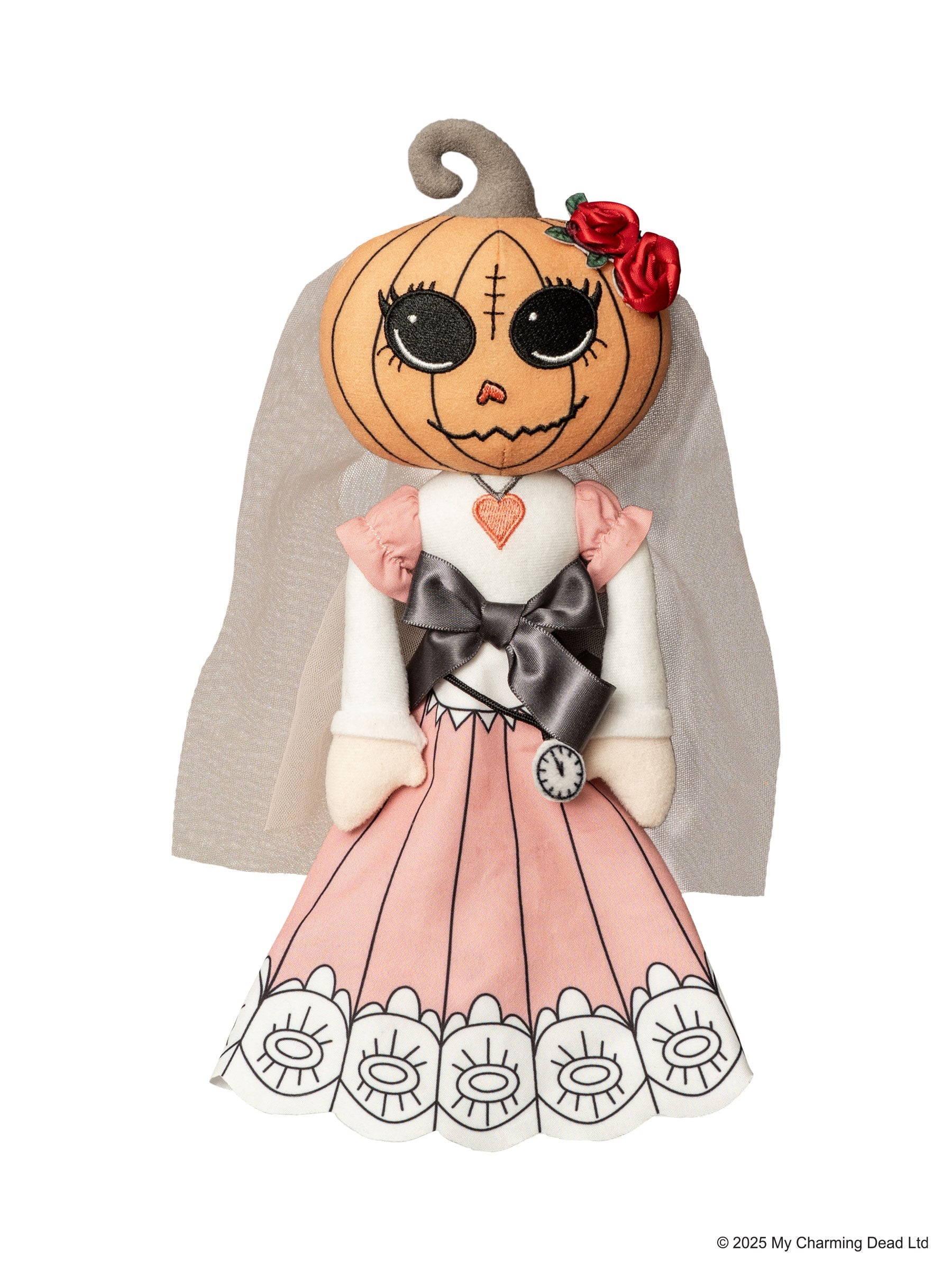 doll with pink dress, pumpkin head and a veil