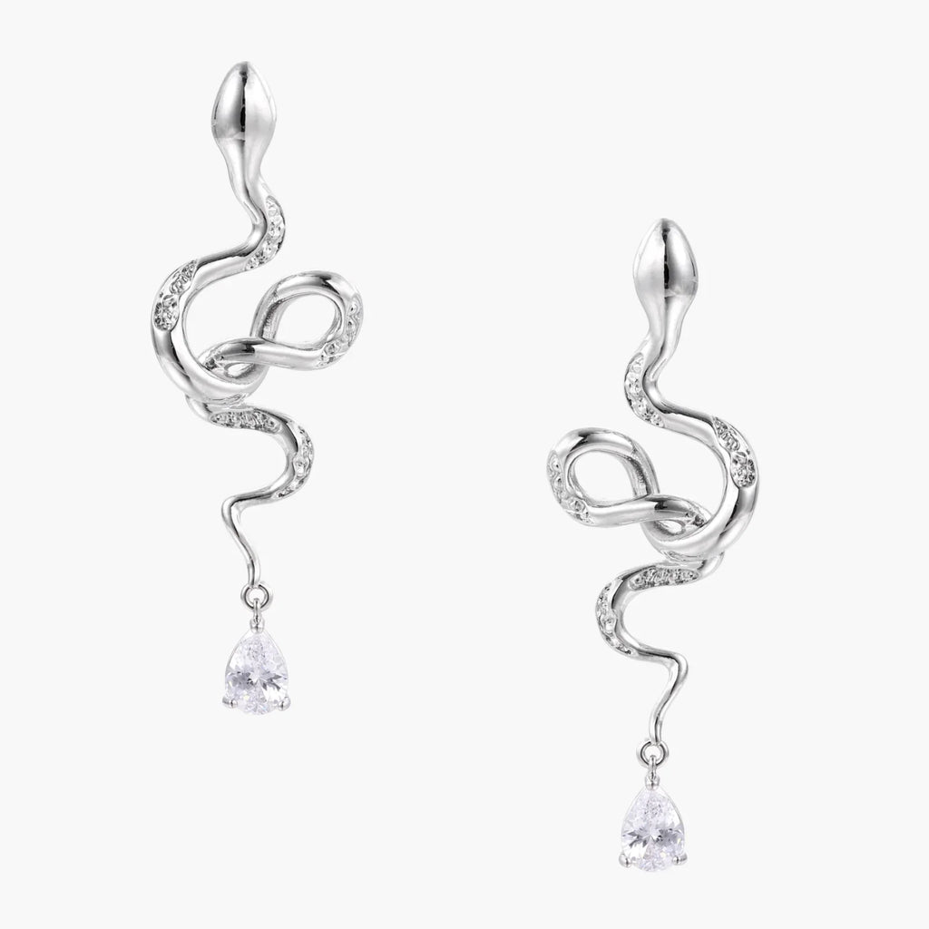 Silver earrings with a flowing design and teardrop-shaped elements on a white background
