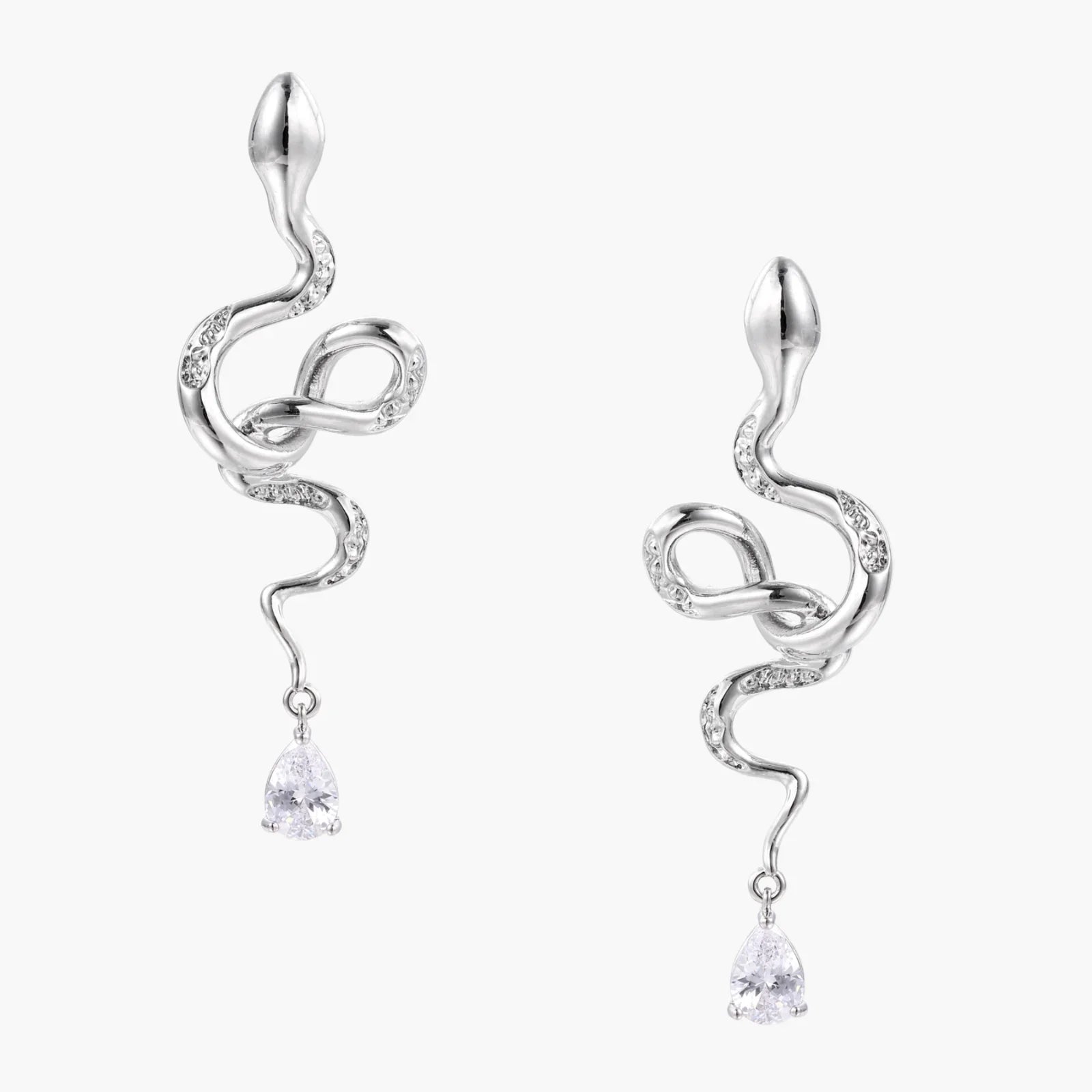 Silver earrings with a flowing design and teardrop-shaped elements on a white background