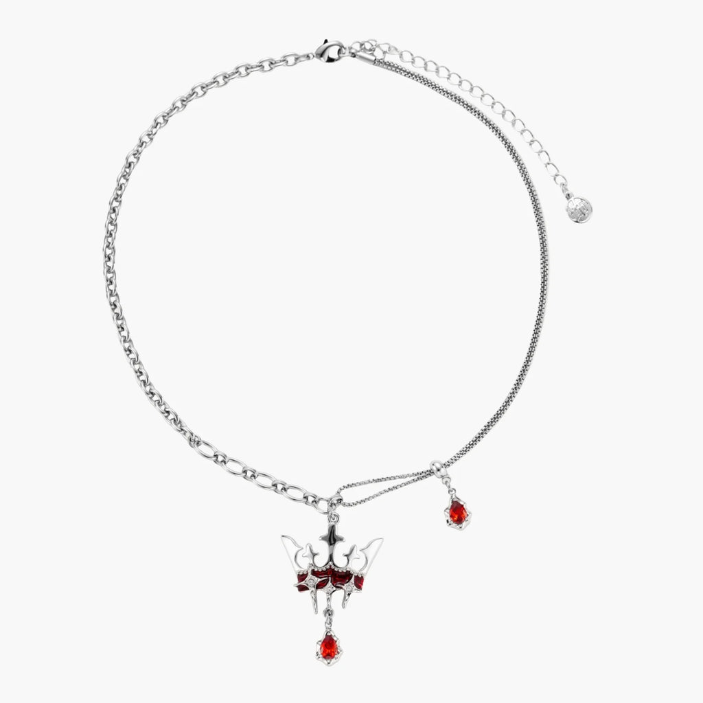 Necklace with a red pendant on a white background