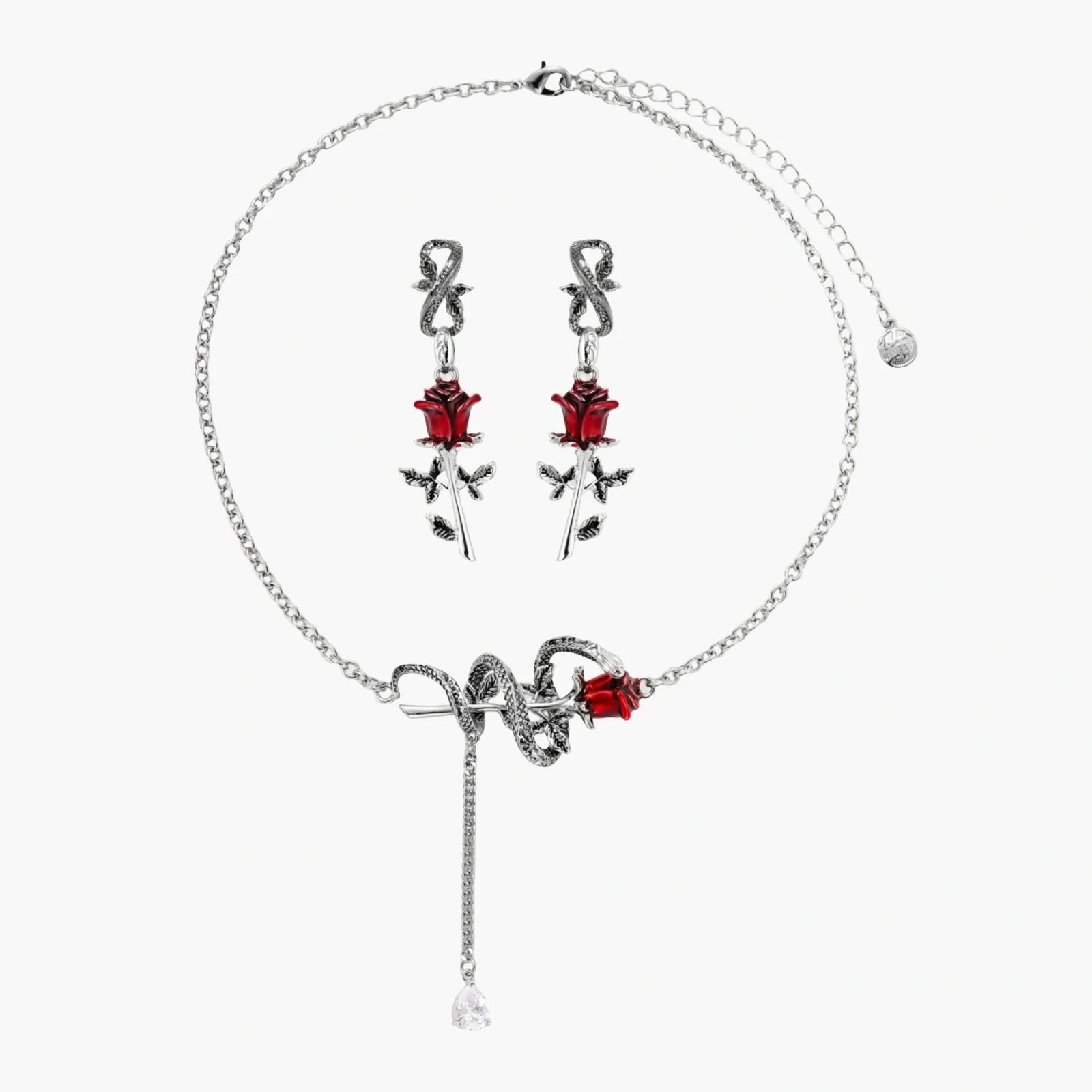 Jewelry set with necklace and earrings featuring red rose designs on a white background