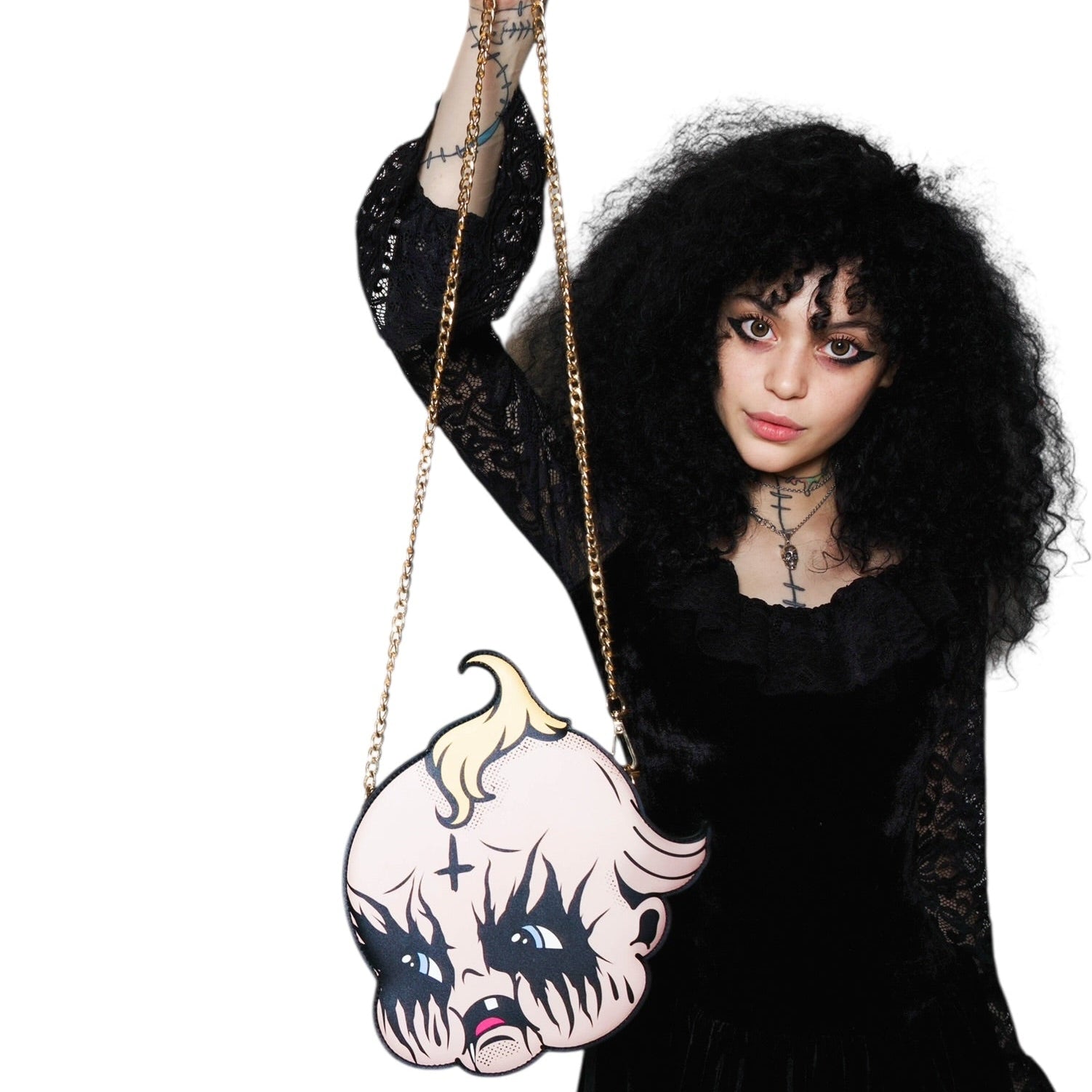 Person holding a bag with a cartoon character design on a white background