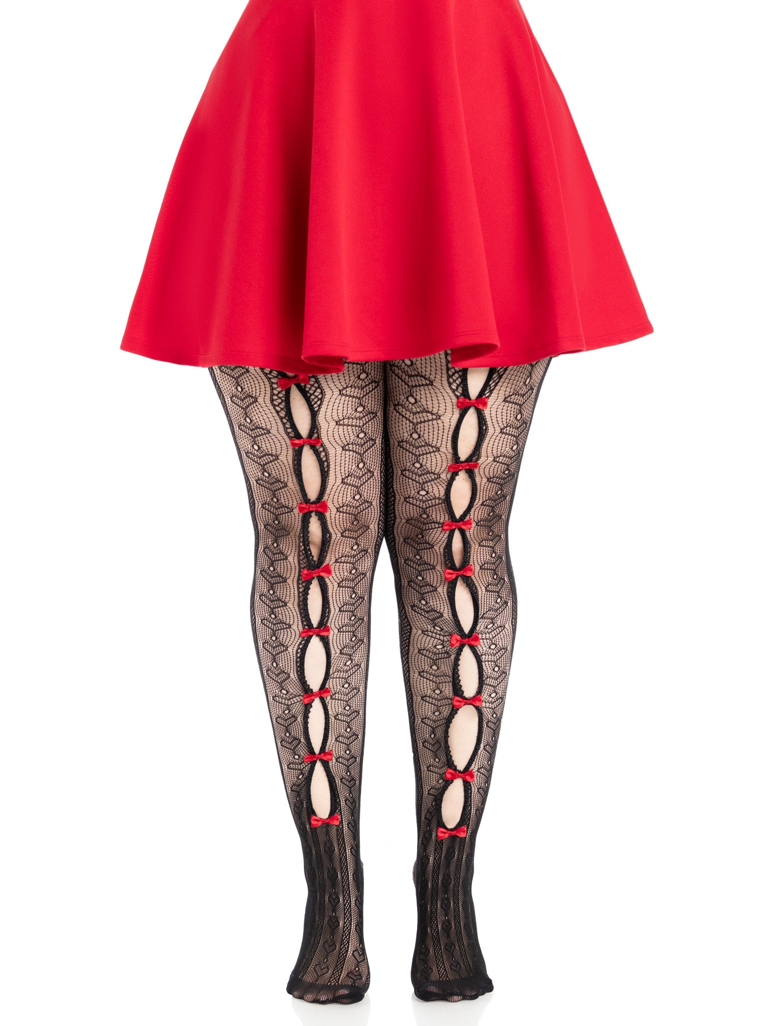 Black lace tights with red bows worn over a red skirt on a white background