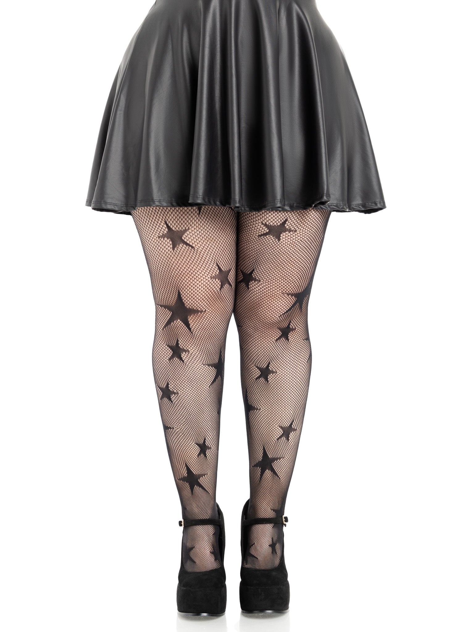 Person wearing black star-patterned fishnet stockings with a black skirt on a white background