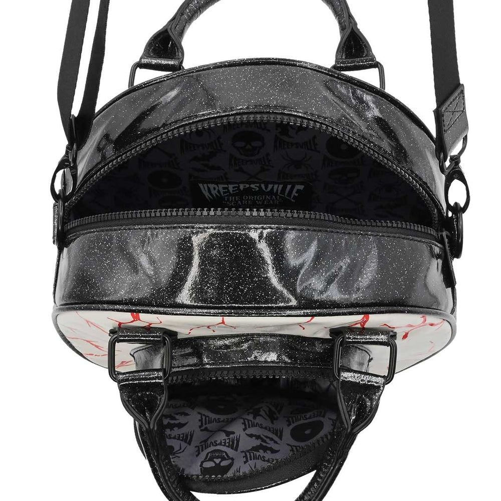 Black glittery handbag with 'Keepsville' branding on a white background
