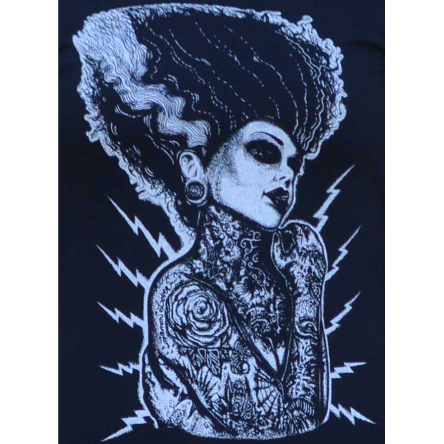 Black and white illustration of a tattooed woman with a large headpiece on a black background