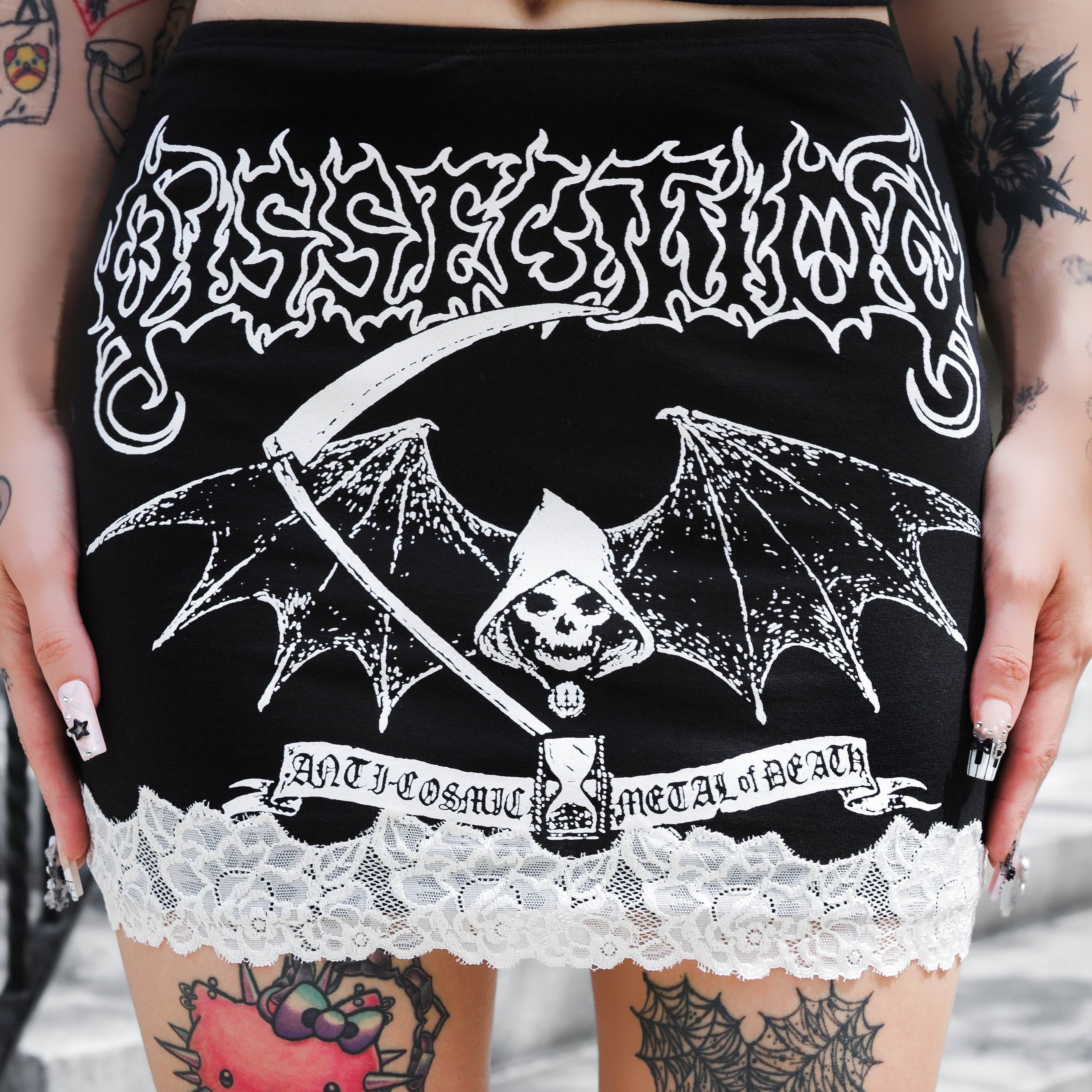 Black and white skirt with skull and bat wings