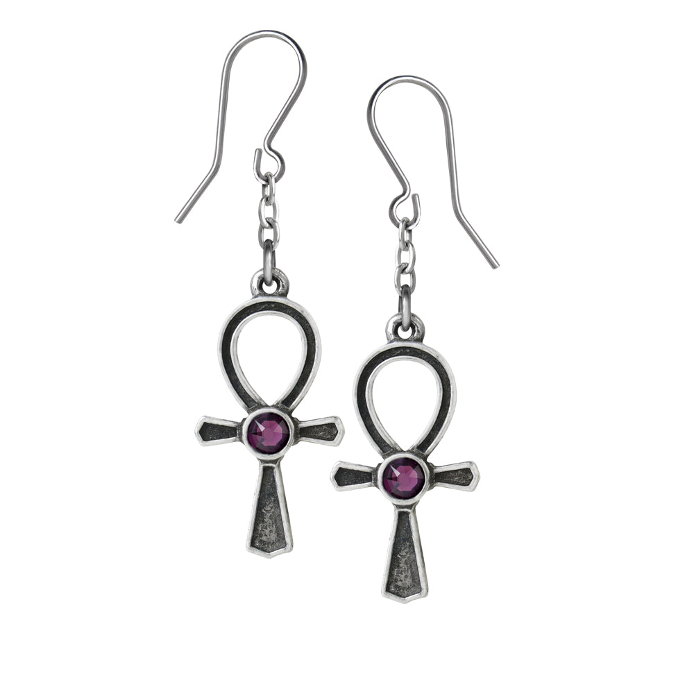 Silver cross-shaped earrings with purple gemstones on a white background