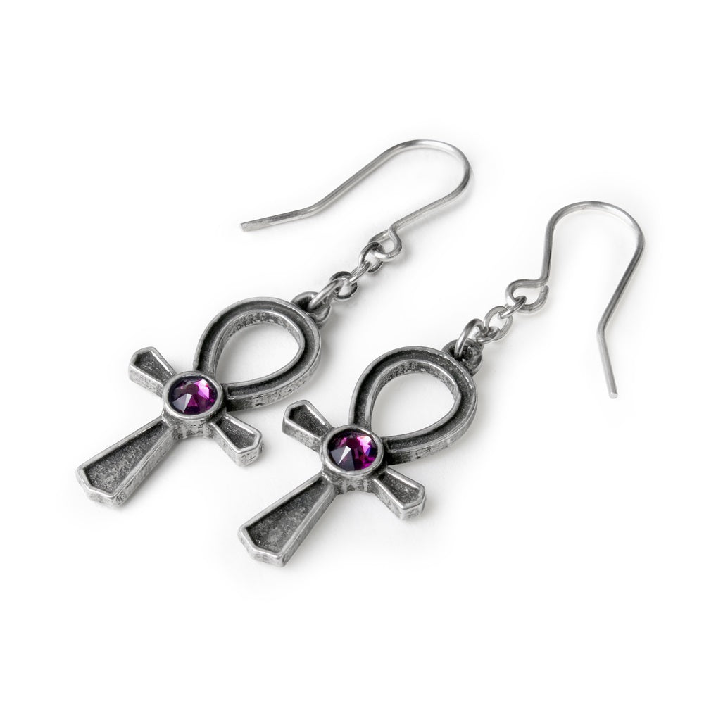Silver cross-shaped earrings with purple gemstones on a white background
