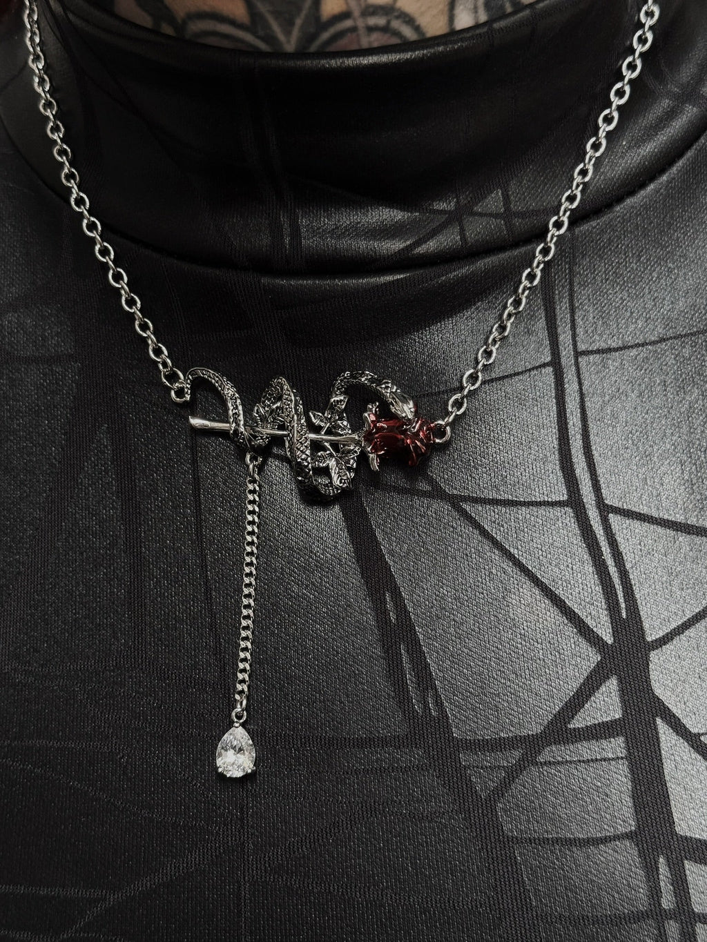 Necklace with a pendant on a black background