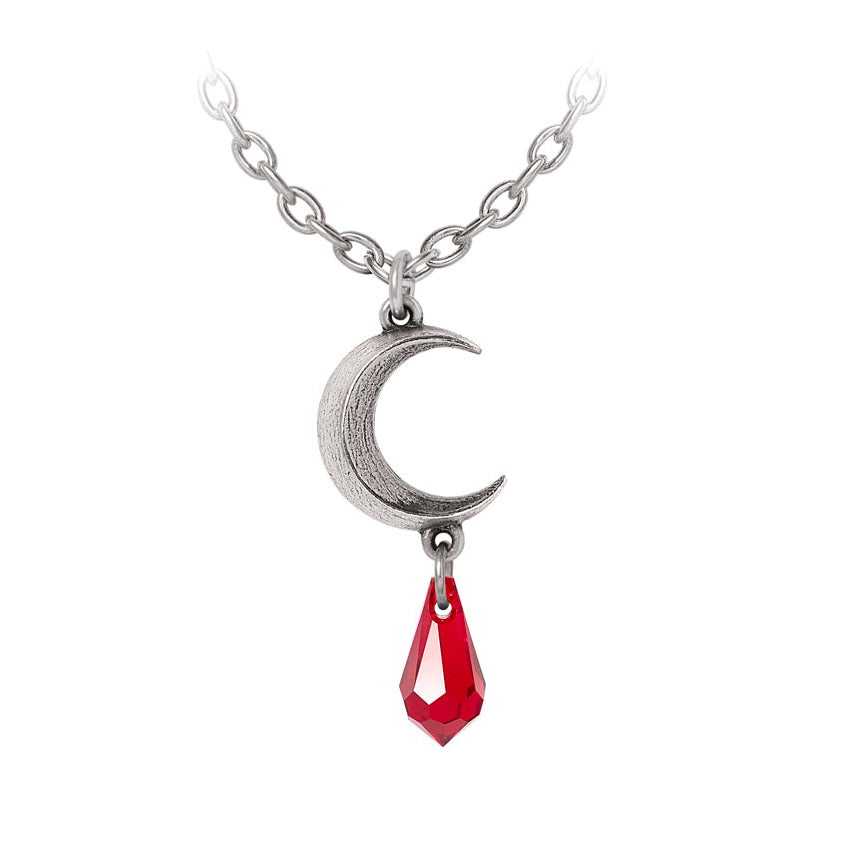 Silver necklace with a crescent moon and red teardrop pendant on a white background
