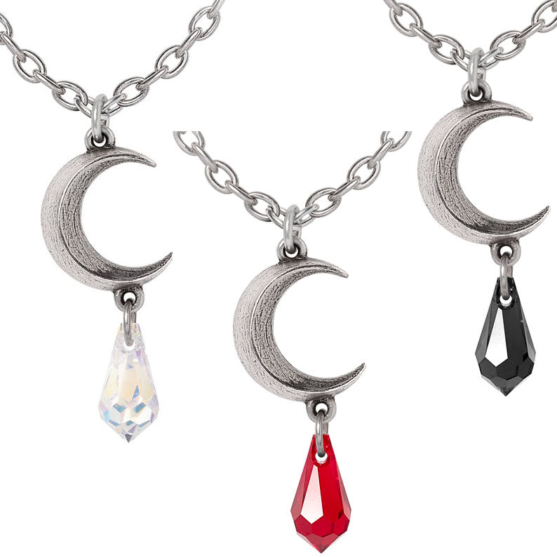 Three moon-shaped pendants with crystal and red teardrop charms on silver chains.