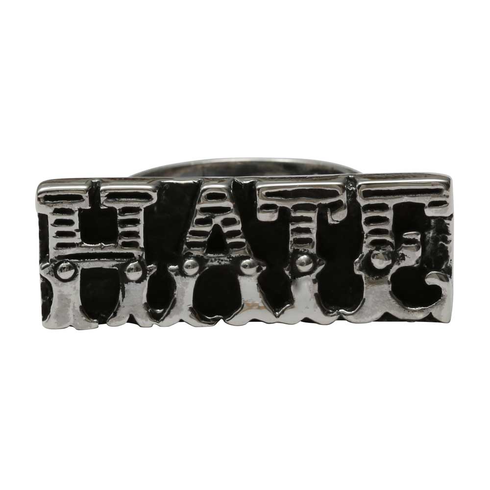 Silver ring with 'HATE' engraved on a white background