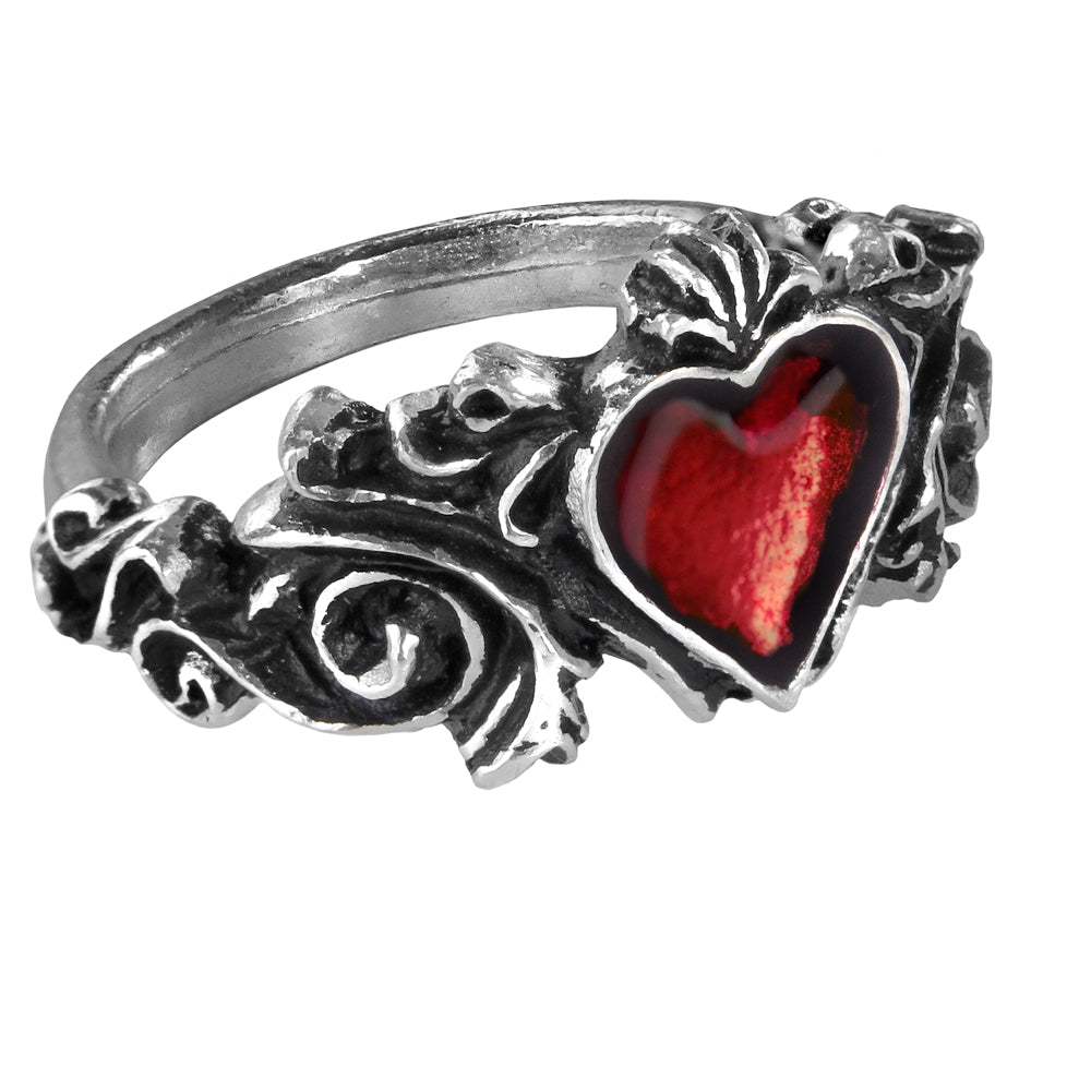 Silver ring with a red heart design on a white background