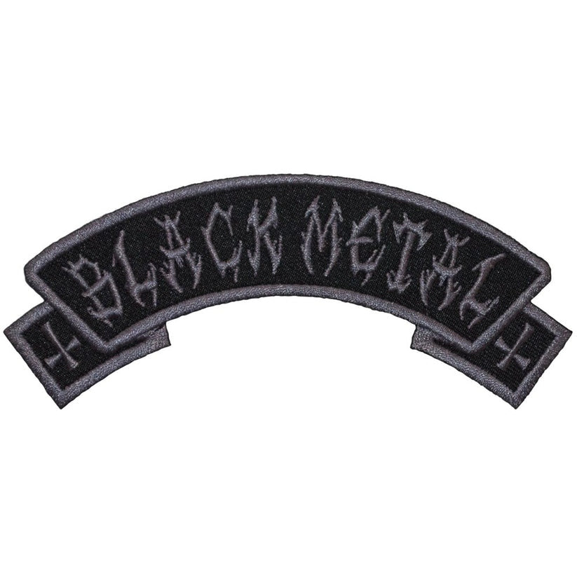 Black metal patch with text on a white background