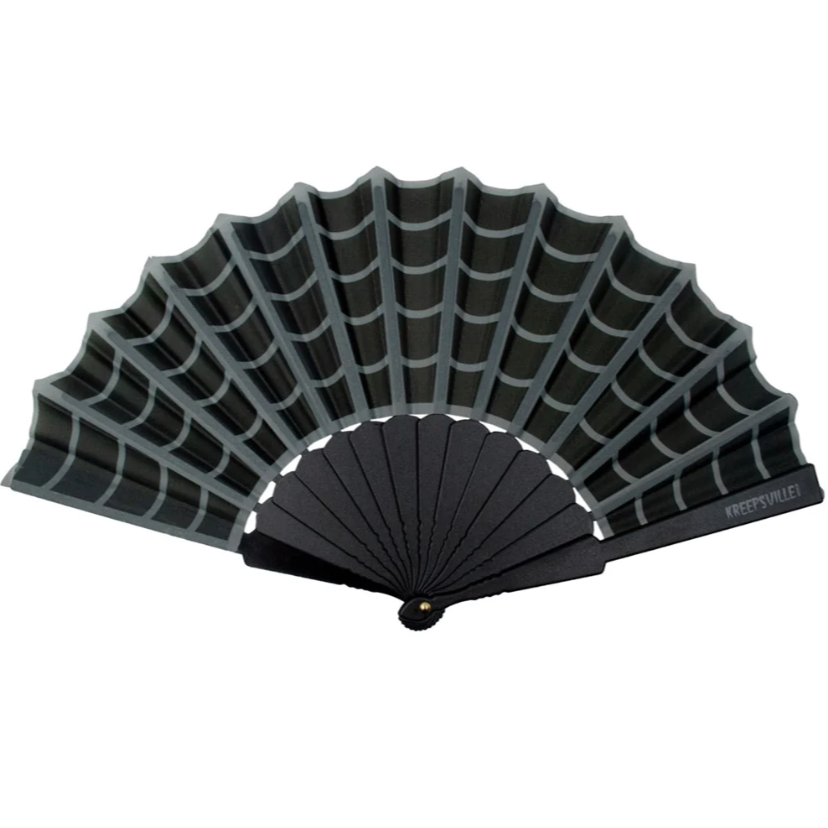 A black folding hand fan with a spiderweb-inspired grid pattern on the canopy and ribs, shown partially open on a white background. The brand name 'WEAPONSWEAR' is printed on the handle.