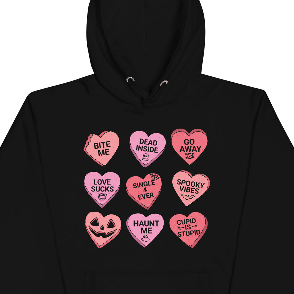 Black hoodie with pink heart-shaped text designs on a white background