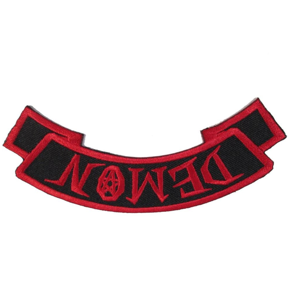 Embroidered patch with 'DEMON' text on a white background