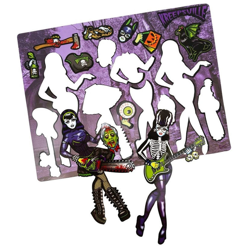 Decorative mat with silhouettes of people and Halloween-themed decorations on a purple background.