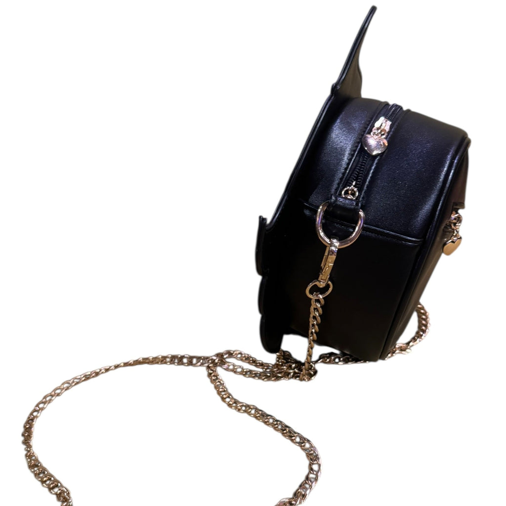 Black handbag with a gold chain strap on a white background
