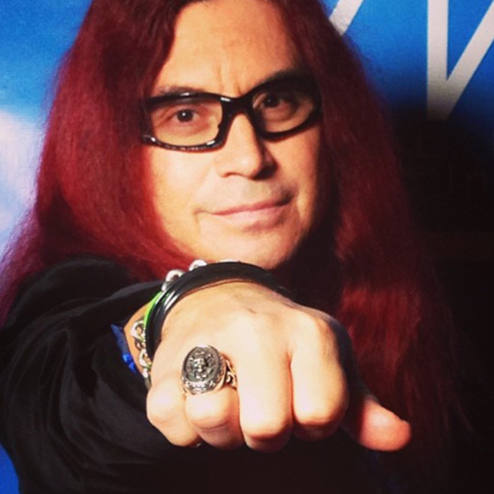 Woman wearing silver jewelry including a necklace, ring, and bracelet.