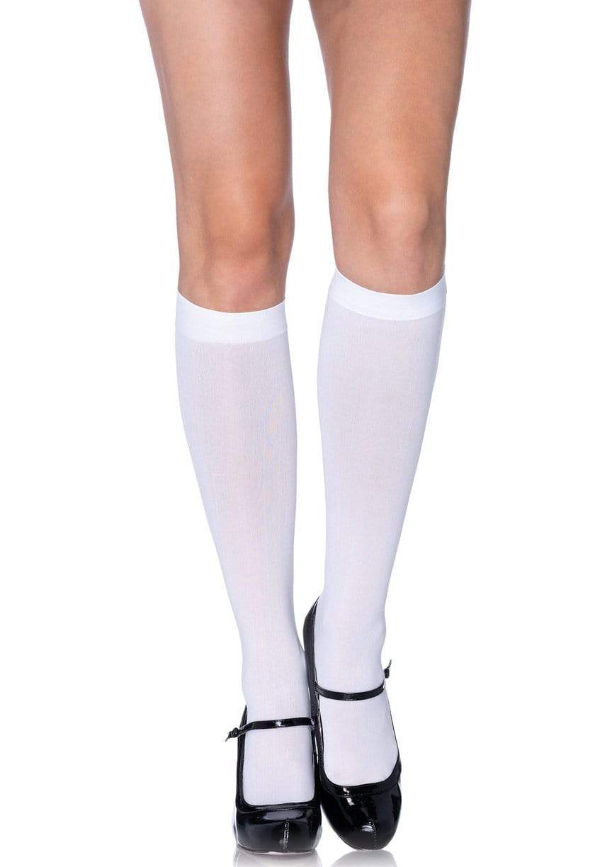 White knee-high socks and black shoes on a white background