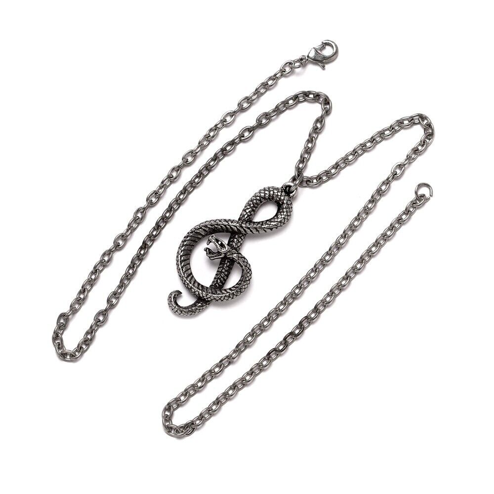 Silver chain necklace with a unique pendant on a white background