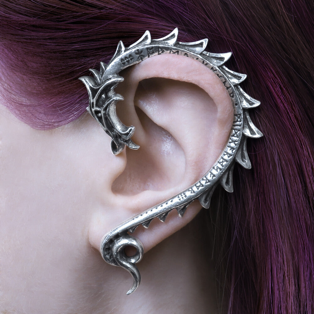Silver ear cuff worn by a person with purple hair