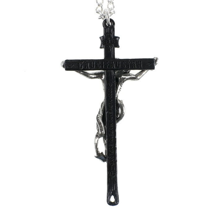 Black crucifix pendant on a white background