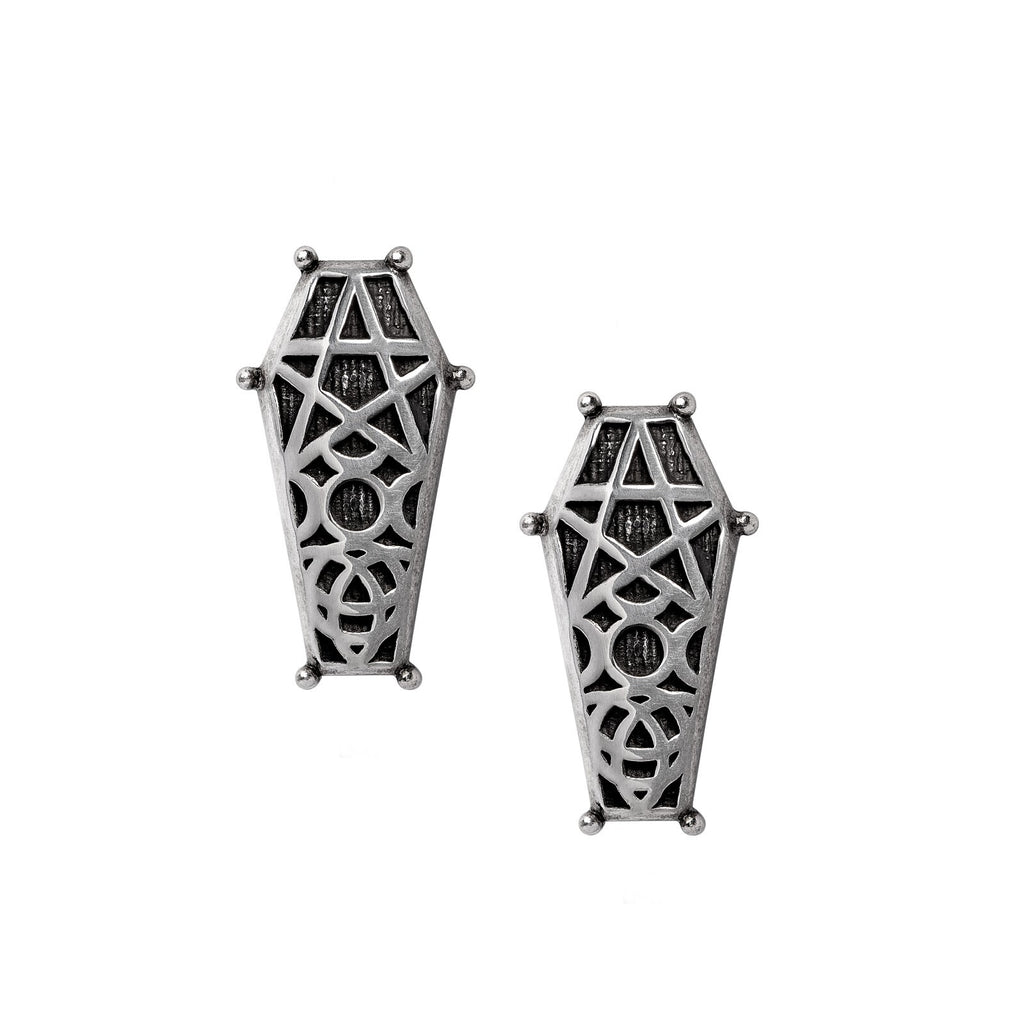Pair of silver coffin-shaped earrings with intricate designs on a white background