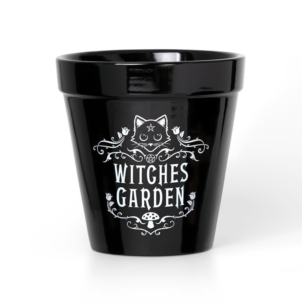 Black pot with 'Witches Garden' text and cat design on a white background
