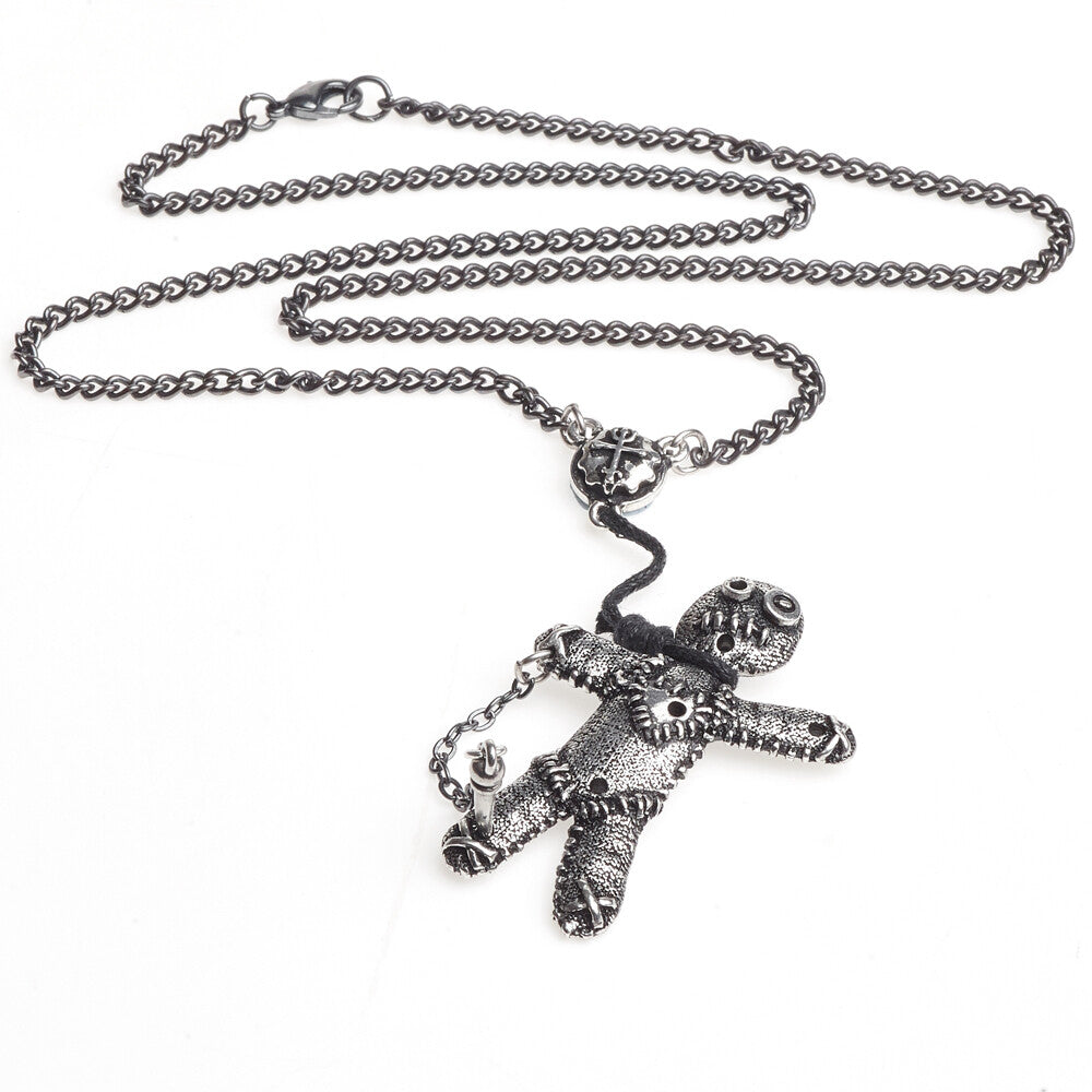 Silver voodoo doll pendant on a chain against a white background