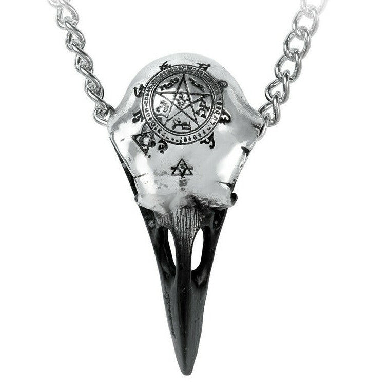 Silver pendant on a chain with intricate designs on a white background