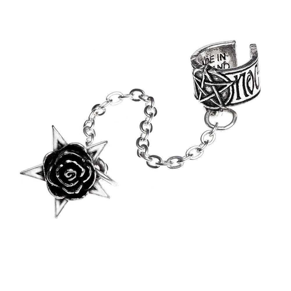Two silver rings with a rose and chain design on a white background