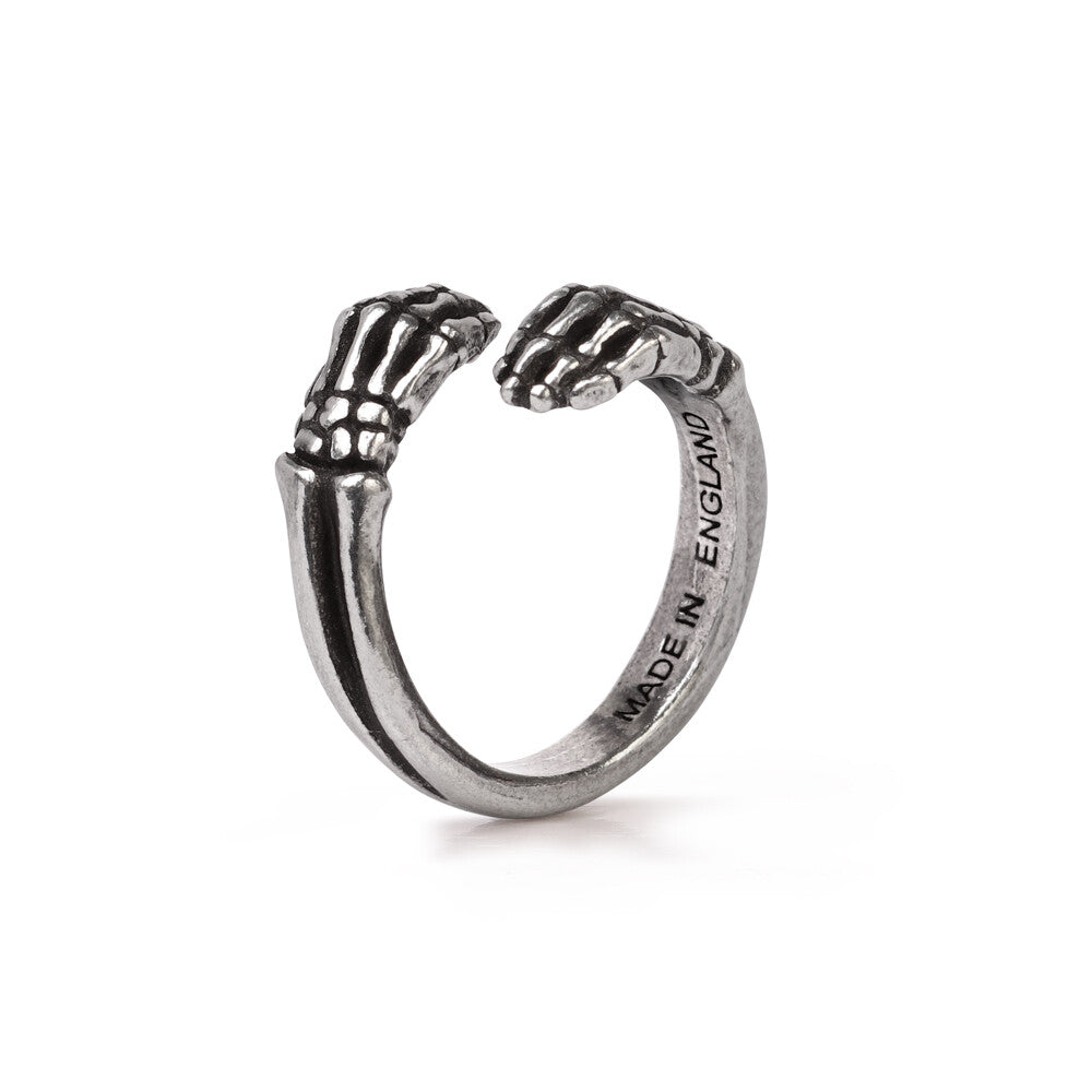 Silver ring with hand design on a white background