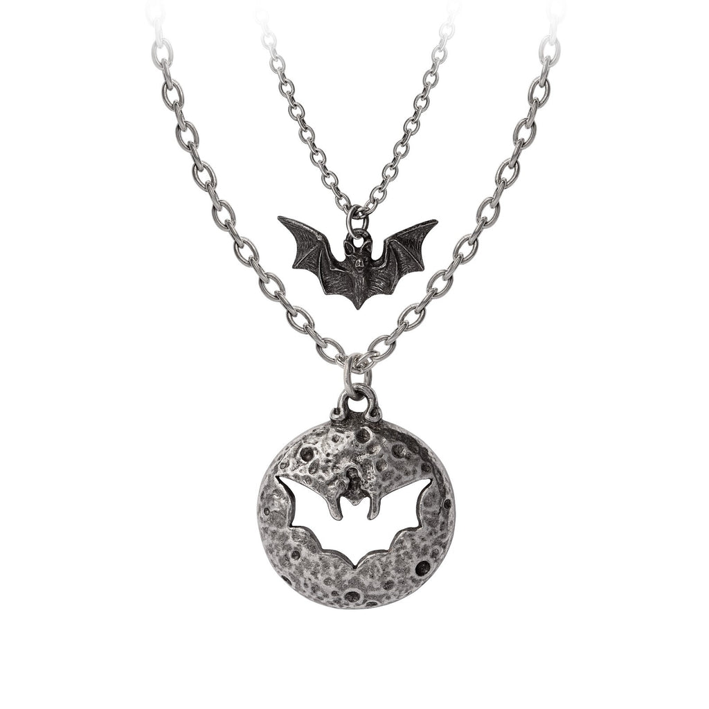 Necklace with bat and moon pendant on a white background