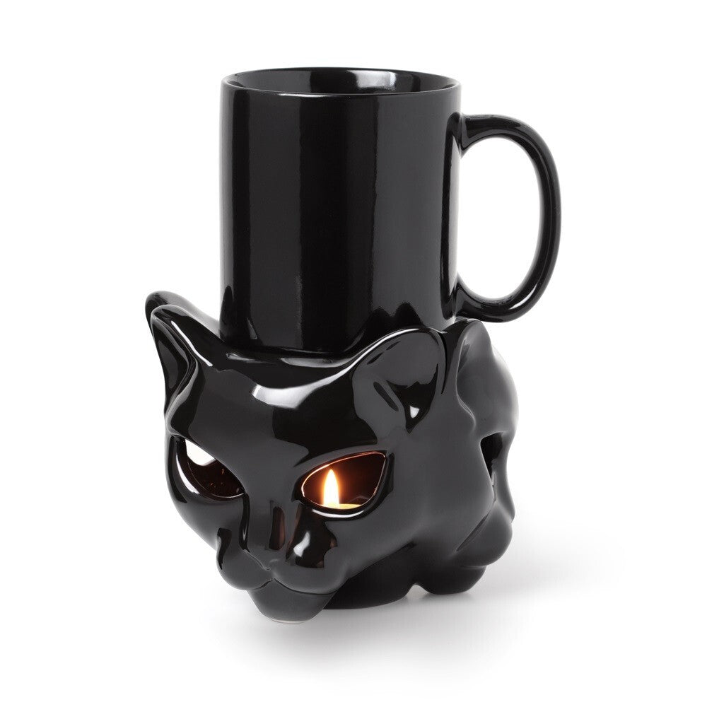 Black cat-shaped mug with a top hat on a white background