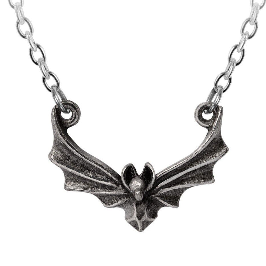 Silver bat-shaped pendant on a chain against a white background