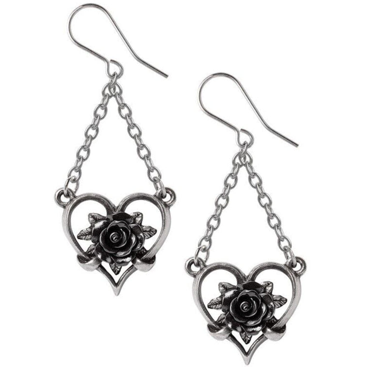 Pair of silver heart-shaped earrings with black rose designs on a white background