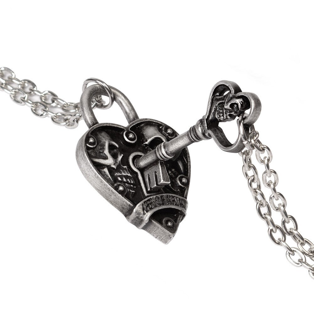 Heart-shaped lock and key pendant on a chain against a white background