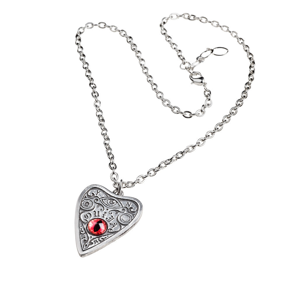 Heart-shaped silver pendant with a red gemstone on a white background