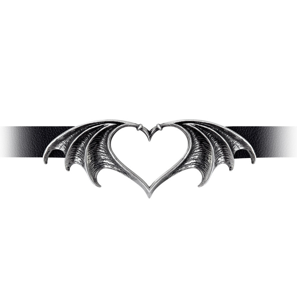 Heart-shaped design with dragon wings on a white background