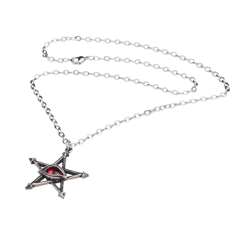 Star-shaped pendant necklace with red gem on a white background