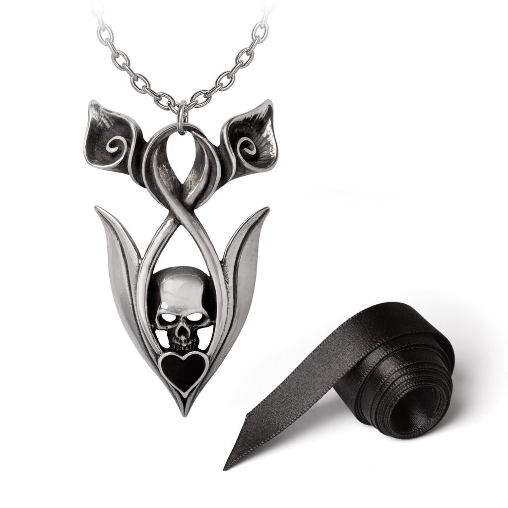 Silver pendant with skull design on a white background