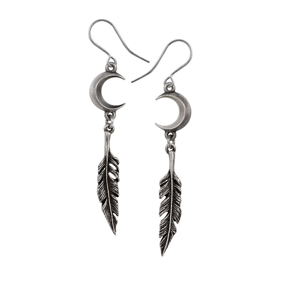 Silver moon and feather earrings on a white background