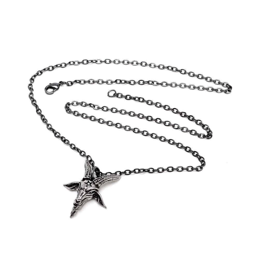 Silver chain necklace with a star-shaped pendant on a white background