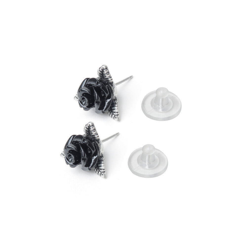 Black rose-shaped earrings on a white background