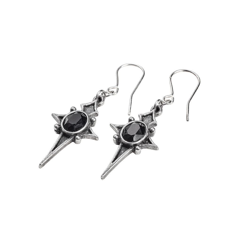Pair of silver earrings with black gemstones on a white background