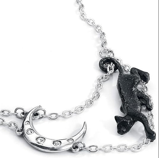 Necklace with a black cat and crescent moon pendant on a white background