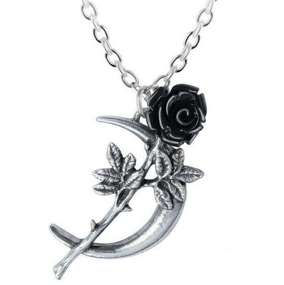 Silver crescent moon pendant with black rose on a white background